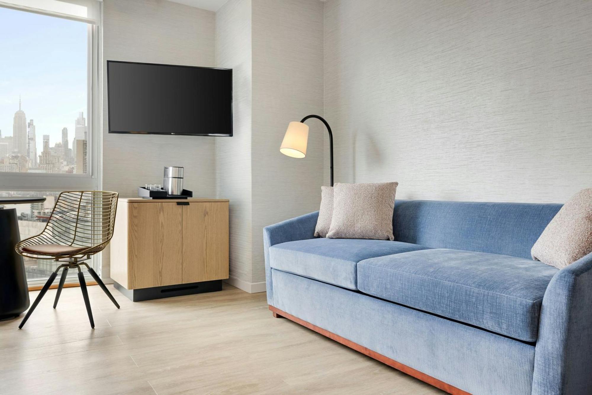 Chambre Lit King-Size avec canapé-lit