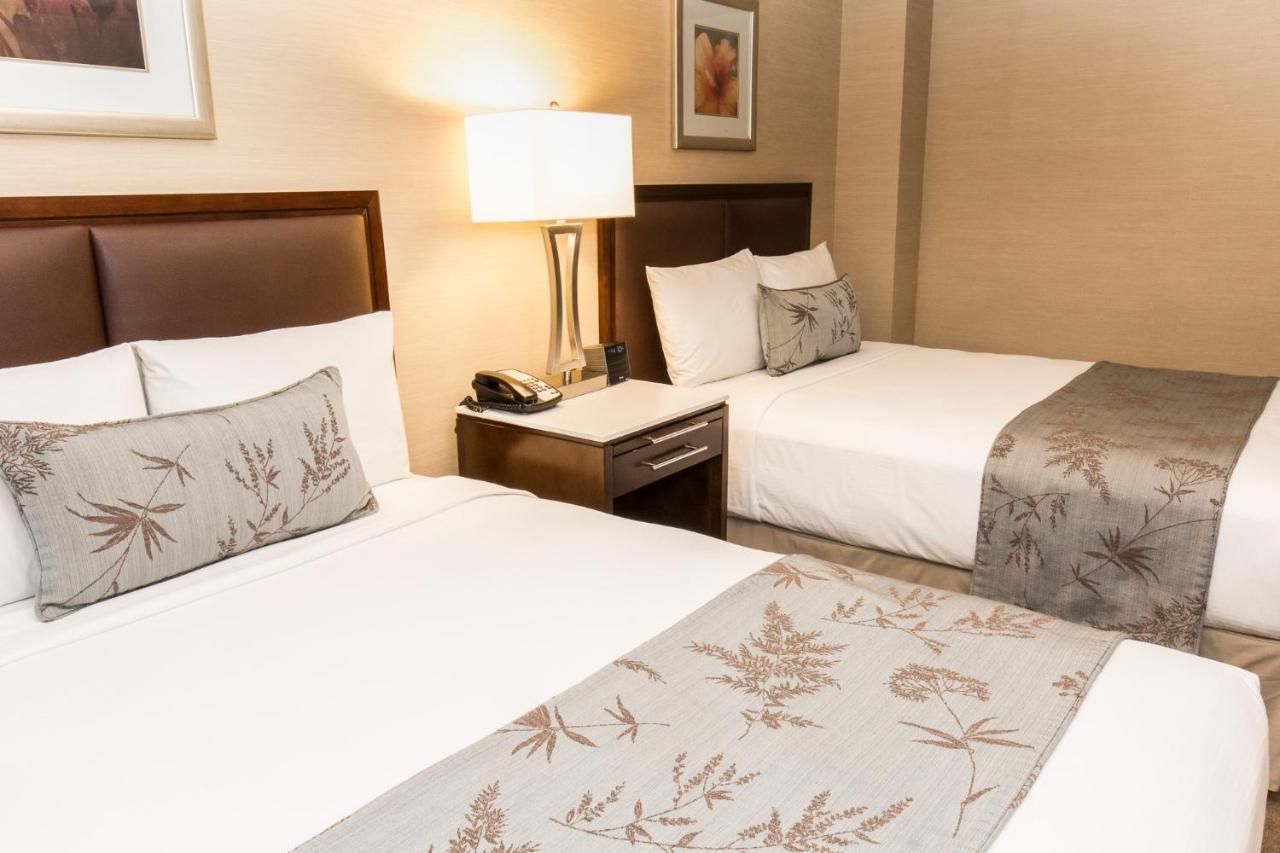 Chambre Double avec 2 Lits Doubles - Accessible aux Personnes à Mobilité Réduite
